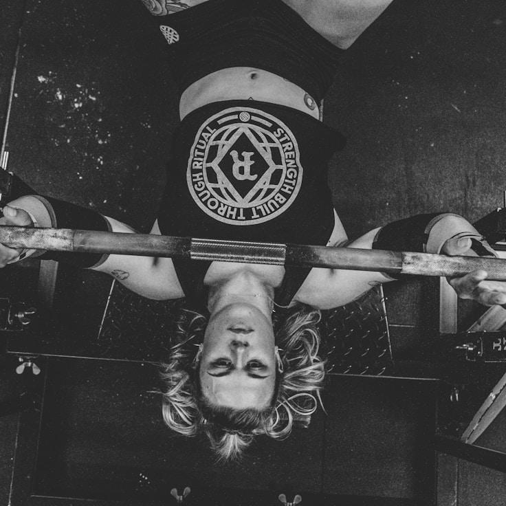 Women in a fitness class doing stretching and mobility exercises